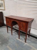 Georgian-style small mahogany sideboard, the rectangular top with broad crossbanded border and