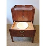 19th century mahogany commode, the galleried top above two cupboard doors, drawer under