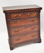 20th century stained mahogany chest of four drawers with fold-out top, on bracket feet