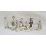 Collection of mainly Nao china figurines, a Lladro group of lamb with cheetah 6926 and a Lladro