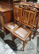 Set of four 20th century oak slatback dining chairs with drop-in vinyl seats (4)  Condition