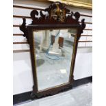 19th century wall mirror with fretwork carved frame surmounted by ho-ho bird, rectangular plate