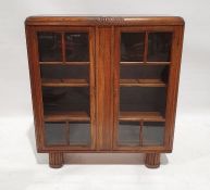 Early 20th century oak bookcase with glazed doors