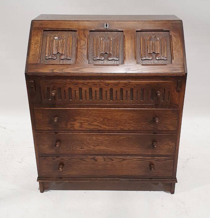 20th century oak bureau, the drop-front with carved scroll