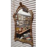 Modern wall mirror in moulded gilt-effect frame