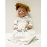 J.D.Kestner '245' bisque head baby doll, marked to back of head, blue eyes, open mouth, 34cm long