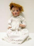 J.D.Kestner '245' bisque head baby doll, marked to back of head, blue eyes, open mouth, 34cm long