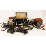 Collection of nine vintage cameras and cine cameras including Bell & Howell 6248mm cine camera (with