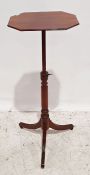 19th century mahogany height adjustable side table on turned column to three fluted legs