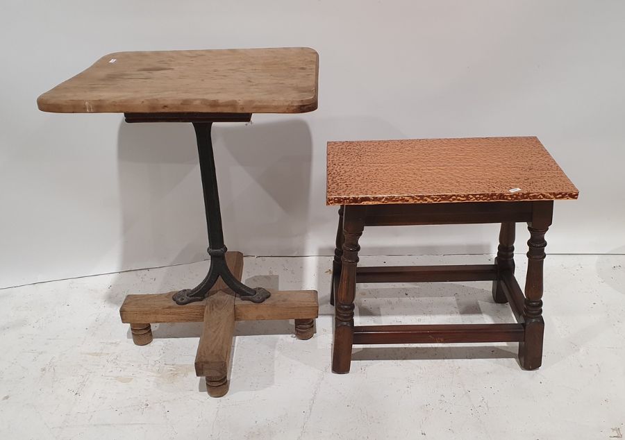 20th century pine occasional table with cast iron supports and mahogany coffee table with beaten
