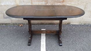 20th century dark elm extending table with trestle-style base