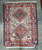 Eastern-style rug with hooked medallions and assorted animals and one further rug (2)