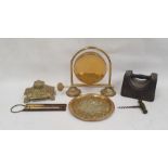 Brass table gong, a brass inkwell of square form with scrolling floral decoration and various