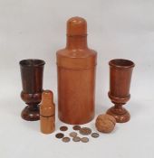 Large treen medicine bottle container, 24cm high, a smaller example and a pair of turned treen