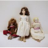 An Ellie's Doll workshop all porcelain doll on stand, a Pauline's limited edition doll 'Demi' no