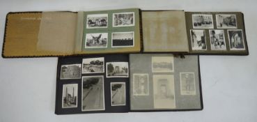 Three World War II photograph albums to include a leather photo album and contents containing