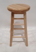 Modern pine stool with rotating seat