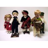 Nine various modern bisque dolls with cloth bodies and the associated stands (9)