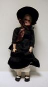 Armand Marseille bisque headed doll, no.390, in black satin and velvet dress, 57cm high