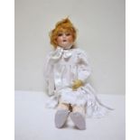 Schoenau & Hoffmeister bisque headed doll with sleeping blue eyes and ball jointed composition body,