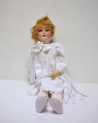 Schoenau & Hoffmeister bisque headed doll with sleeping blue eyes and ball jointed composition body,