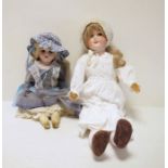 German bisque headed doll with sleeping brown eyes and in white nightgown and lace cap, 63cm and a