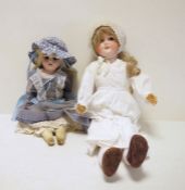 German bisque headed doll with sleeping brown eyes and in white nightgown and lace cap, 63cm and a