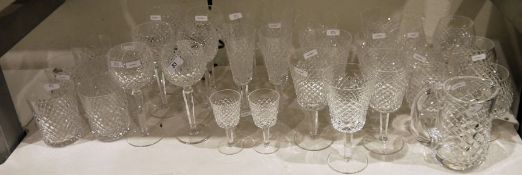 Suite of Waterford cut drinking glasses, relief diamond patterned, 34 pieces viz:- six hock glasses,