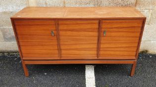 Greaves & Thomas teak sideboard with three cupboard doors, on square section supports, 132cm x 75cm