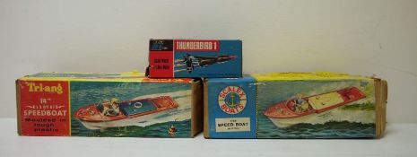 Scalex speedboat, no.415S, boxed, a Triang 14" electric speedboat, boxed and a Thunderbird 1
