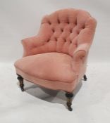 Pair of late Victorian armchairs in pink ground upholstery, turned and fluted front legs to black