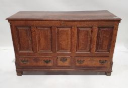 Possibly 18th century oak mule chest, the rectangular top with moulded edge above five panelled