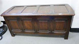 20th century dark stained chest with panelled top and front, 118cm x 52cm
