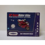 The Discovery Story GP Race Rider Bike, boxed