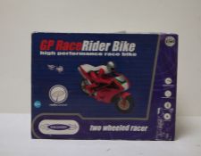 The Discovery Story GP Race Rider Bike, boxed