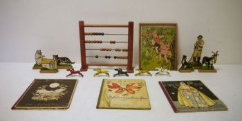 A vintage wooden puzzle, German and other children's books, children's cups, farm figures, etc