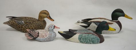 Holland & Holland painted wood mallard decoy duck, another and two further decoy ducks (4)