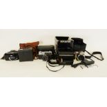 Kodak Brownie 620 camera, an Olympus digital camera, a Polaroid camera and various others (1 box)