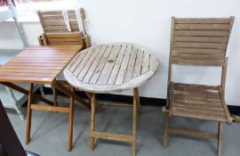 Two wooden folding garden tables and two wooden folding garden chairs