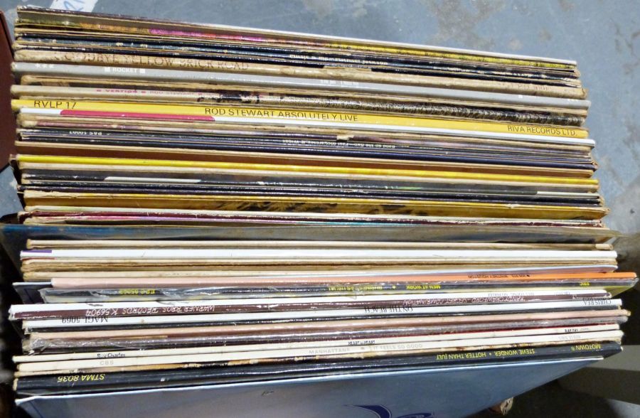 Assorted LP records and singles to include Michael Jackson, Elton John, Rod Stewart, etc