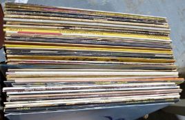 Assorted LP records and singles to include Michael Jackson, Elton John, Rod Stewart, etc