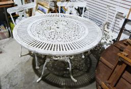 Metal garden table and four chairs (5) Condition ReportFeels structurally solid.