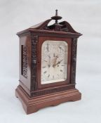Plated wood and mahogany bracket clock, the movement striking a gong, the silvered dial with