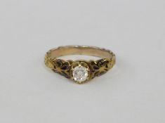 Victorian gold, diamond and enamel ring having ornate shoulders inset with black enamel, oval old