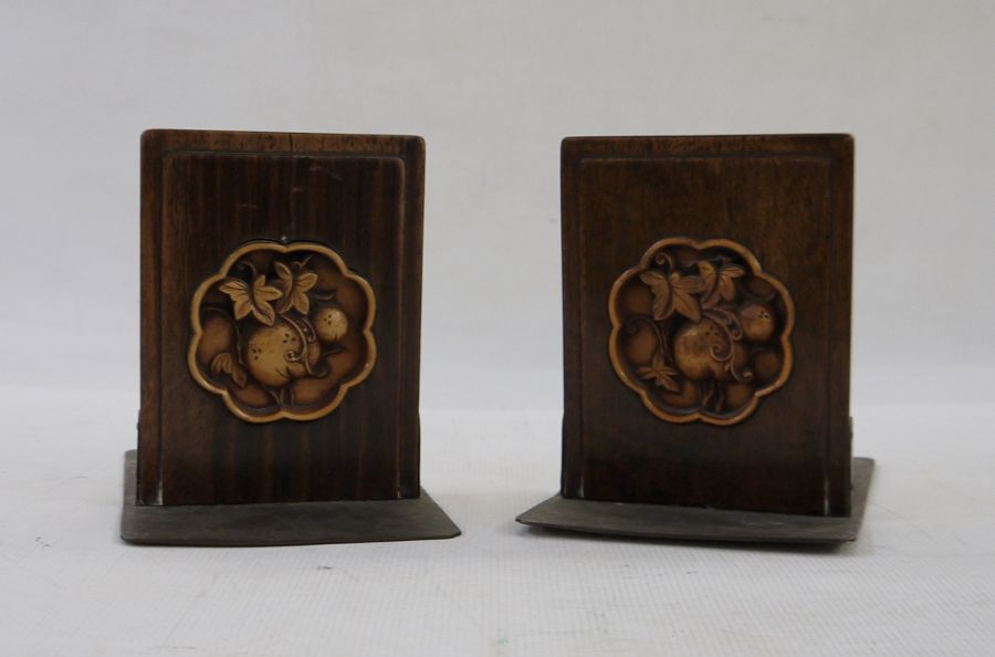 Pair carved and engraved bookends, Arts and Crafts in the Oriental manner (2)