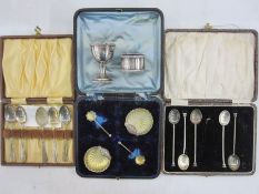 Five silver seal-top coffee spoons, cased, five silver coffee spoons, a silver napkin ring, a silver