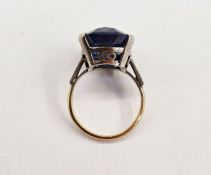 9ct gold and blue stone dress ring set large oval blue faceted stone, claw set  Condition