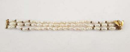 Freshwater pearl and 9ct gold three-strand bracelet having 9ct gold bee pattern clasp