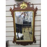 19th century fretwork carved mirror, the rectangular plate in mahogany fretwork carved frame with