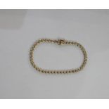 9ct gold and diamond tennis bracelet, each small diamond illusion set, approx. 0.5ct